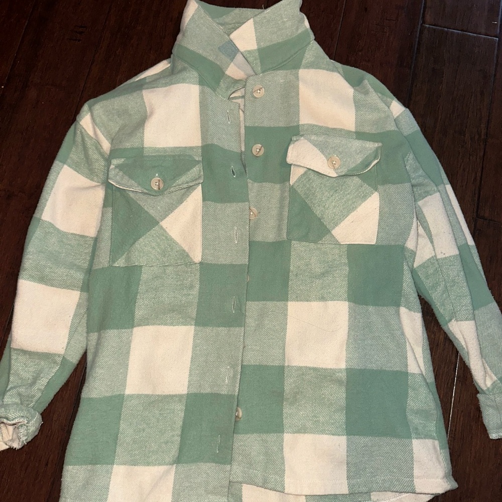 turquoise, checkered, fleece jacket never worn great condition!!!!